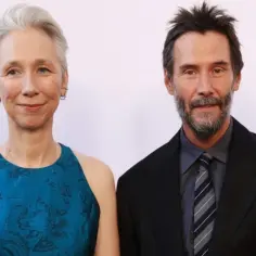 Keanu Reeves z żoną Alexandrą Grant na czerwonym dywanie.