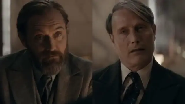 Dwie twarze: Albus Dumbledore z brodą i Gellert Grindelwald w garniturze.